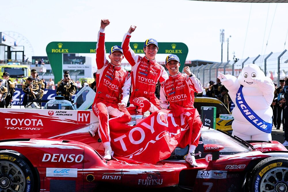 Toyota Racing drivers celebrate on the number 7 TR010 HYBRID