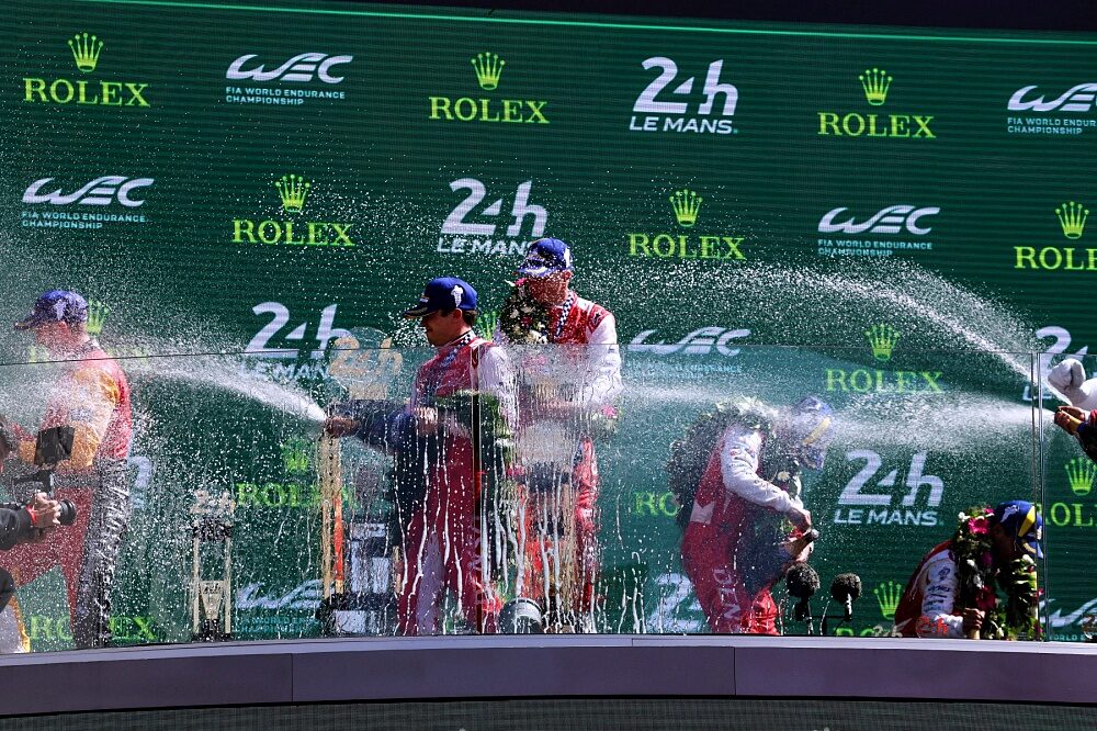 Toyota Racing champagne celebration on the Le Mans podium