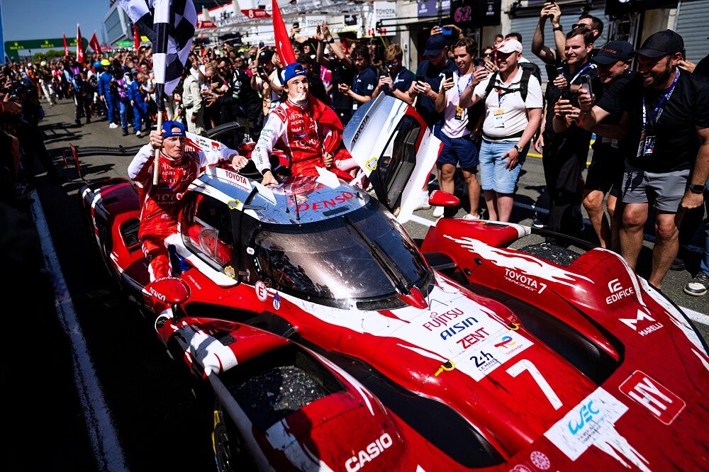 Toyota Racing number 7 passes fans after the Le Mans victory