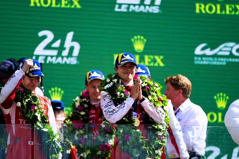 Toyota Racing drivers on the podium after the 2026 Le Mans 24 Hours
