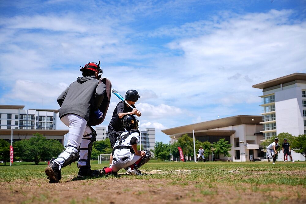 Thailand U12 youth baseball catcher during practice action