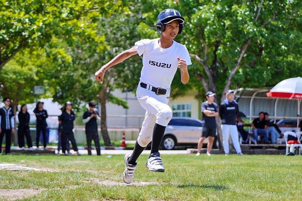 Thailand U12 youth baseball player practices throwing and catching