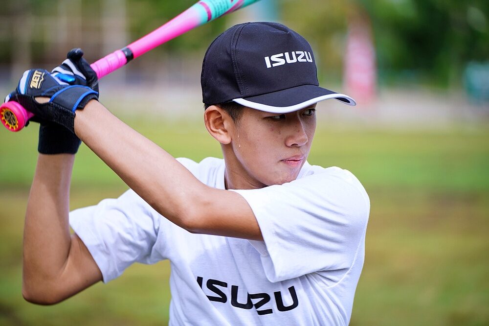 Thailand U12 youth baseball player practices batting