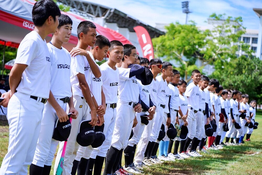 Thailand U12 youth baseball players line up for instructions