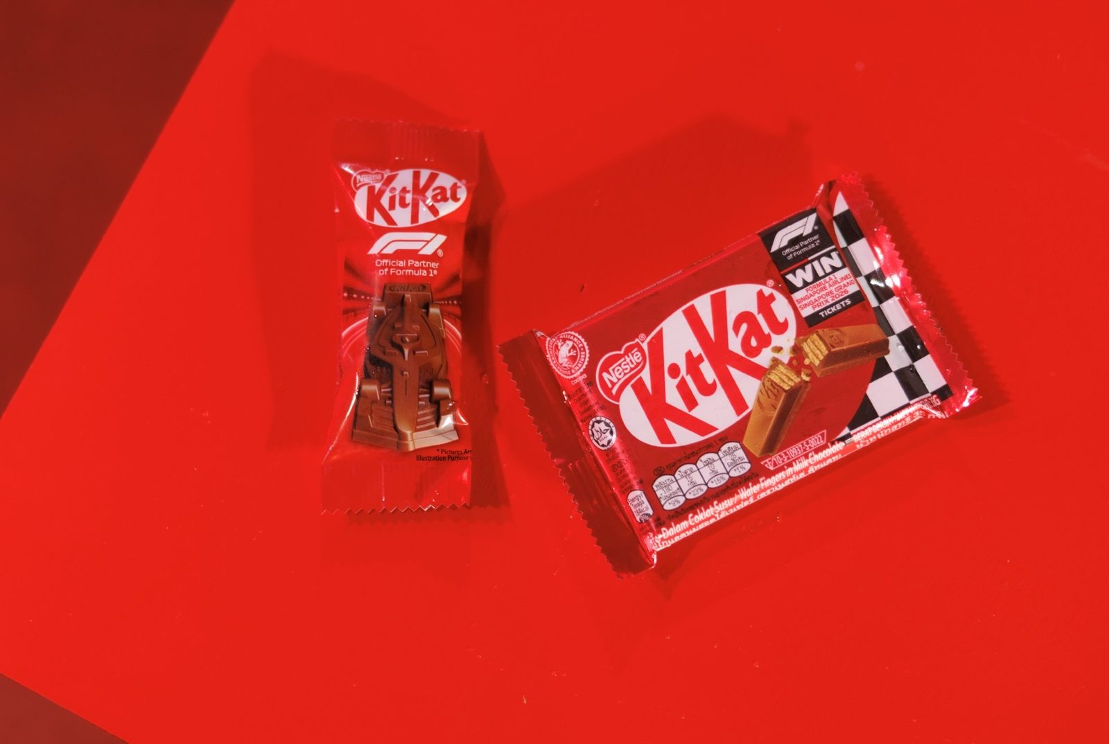 Formula 1 racing car-shaped chocolate representing global partnership