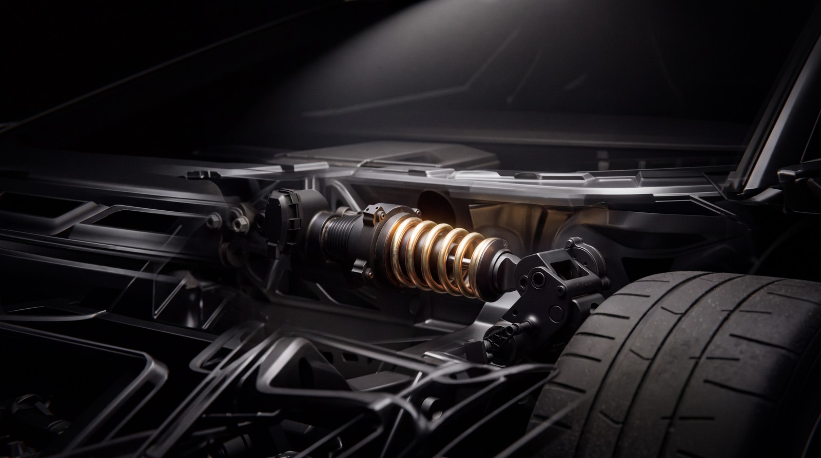 ชุดสปริงโช้คสีทองและยางของ Roadster ในภาพโครงสร้างช่วงล่าง